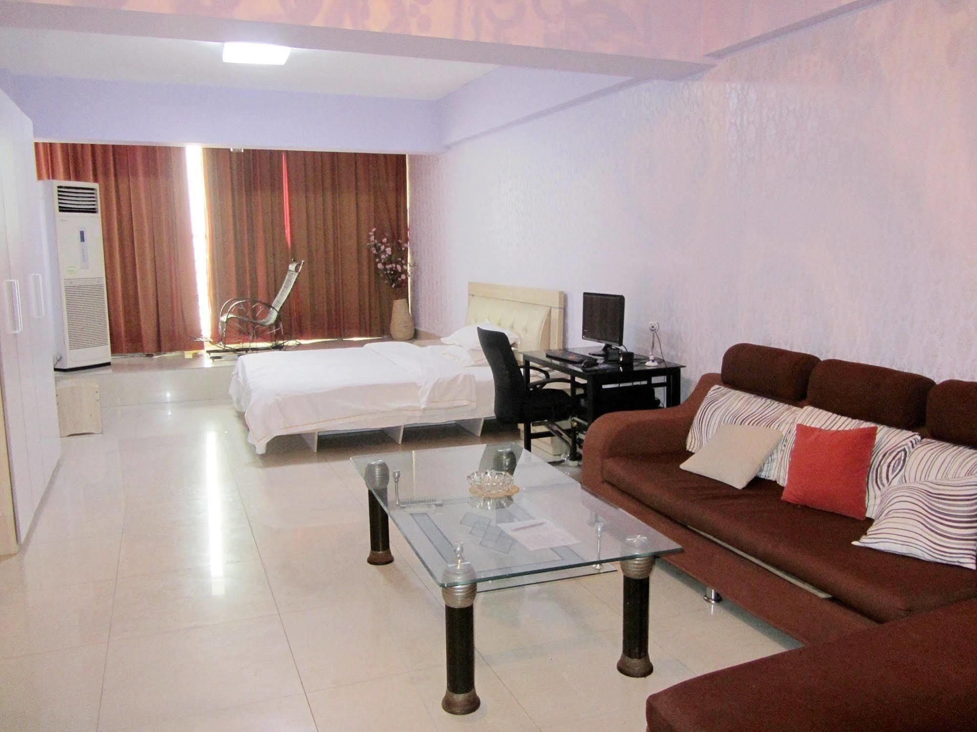 Taohuayuan Apartment Hotel Нанинг Екстериор снимка