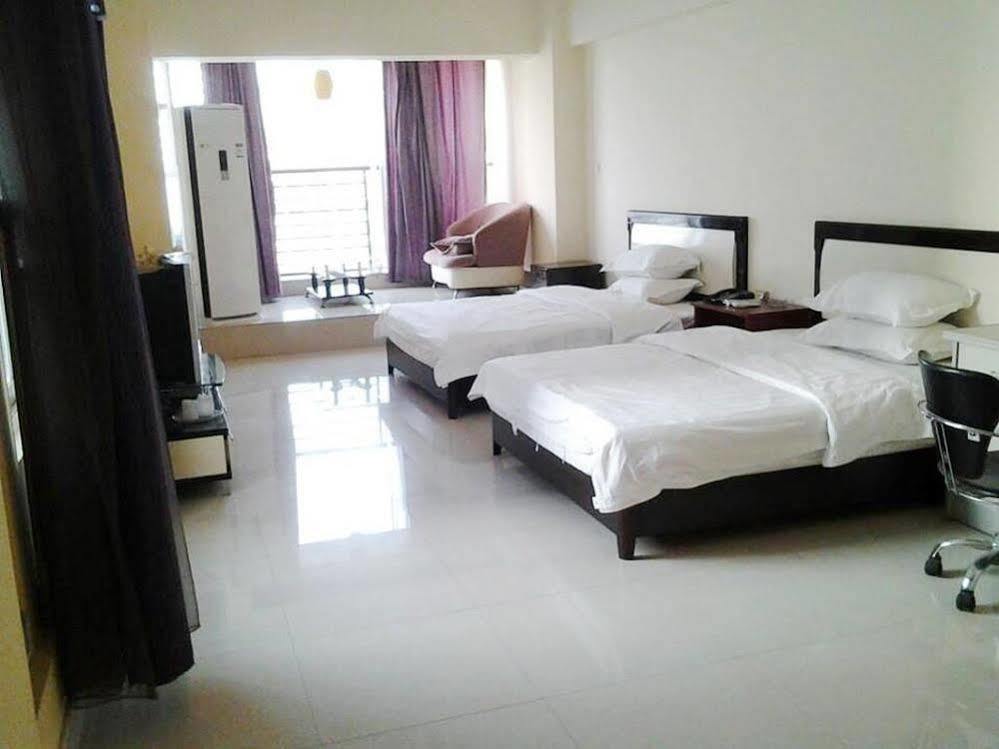 Taohuayuan Apartment Hotel Нанинг Екстериор снимка