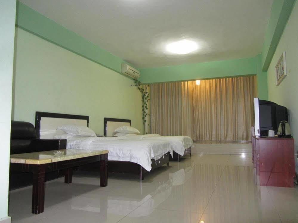 Taohuayuan Apartment Hotel Нанинг Екстериор снимка