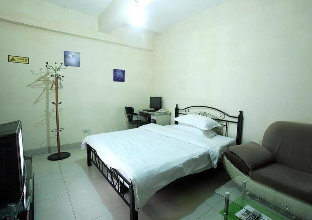 Taohuayuan Apartment Hotel Нанинг Екстериор снимка