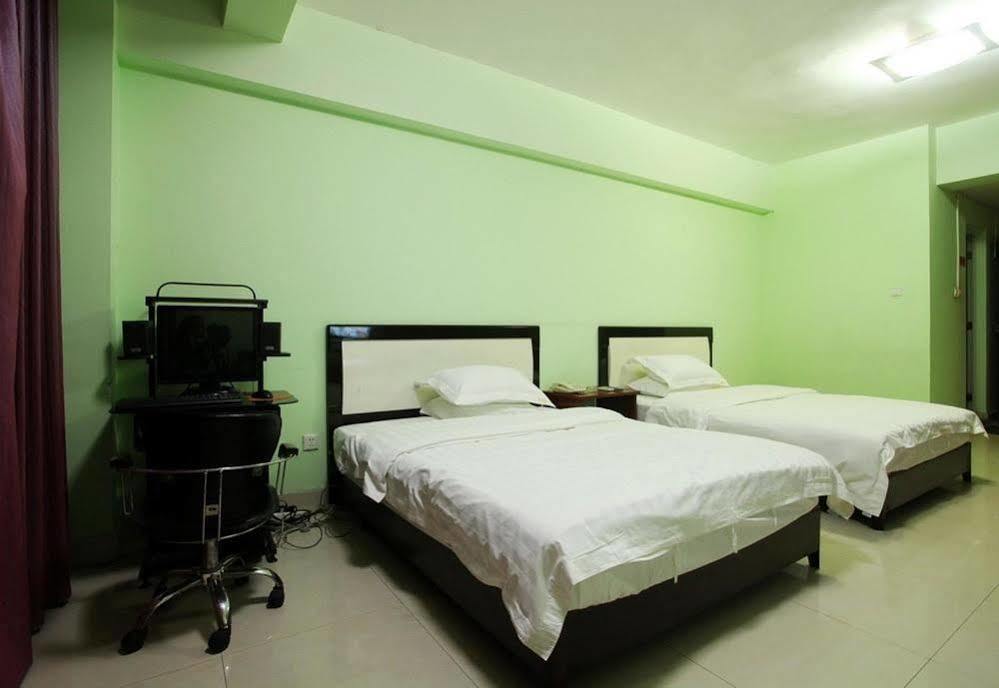 Taohuayuan Apartment Hotel Нанинг Екстериор снимка