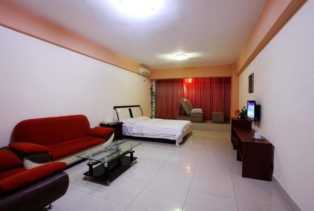 Taohuayuan Apartment Hotel Нанинг Екстериор снимка