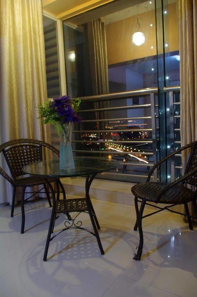 Taohuayuan Apartment Hotel Нанинг Екстериор снимка